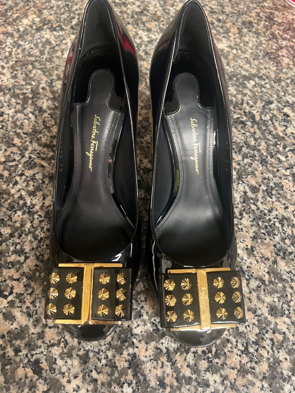 Salvatore Ferragamo Black Patent Pumps with Gold Studded Bow
